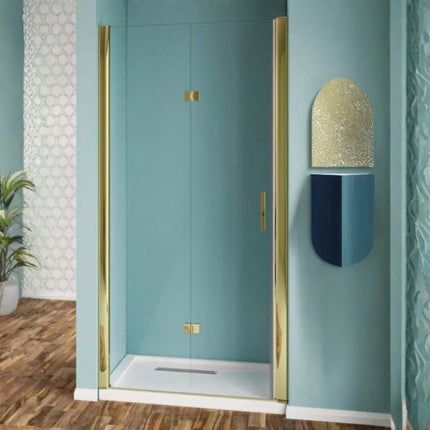 Porta doccia a libro nicchia H190 cristallo trasparente 6mm profili oro lucido, apertura lift-up, maniglia dorata, bagno con decoro geometrico