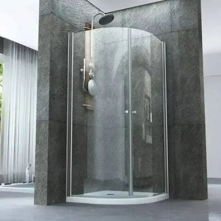 Box doccia semicircolare Cassiopea doppia anta battente cristallo 6mm H190 in bagno moderno con pietra grigia