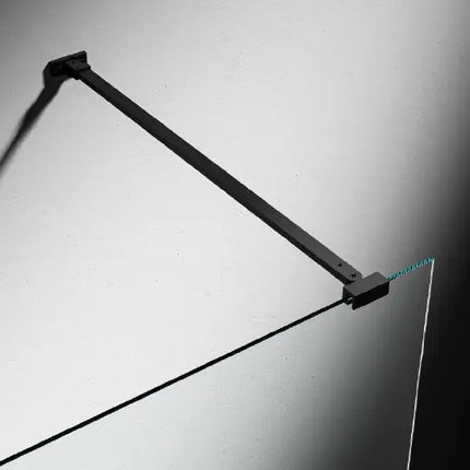 Dettaglio della barra di supporto nera con morsetto di fissaggio al cristallo 6mm della parete doccia walk-in