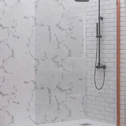 Vista tre quarti parete walk-in H200cm 8mm profili rose gold con piatto doccia bianco filo pavimento