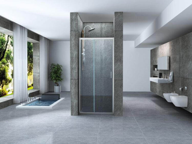 Porta doccia scorrevole trasparente 6mm H190 ambientata in bagno completo con vasca e sanitari, vista ampia frontale