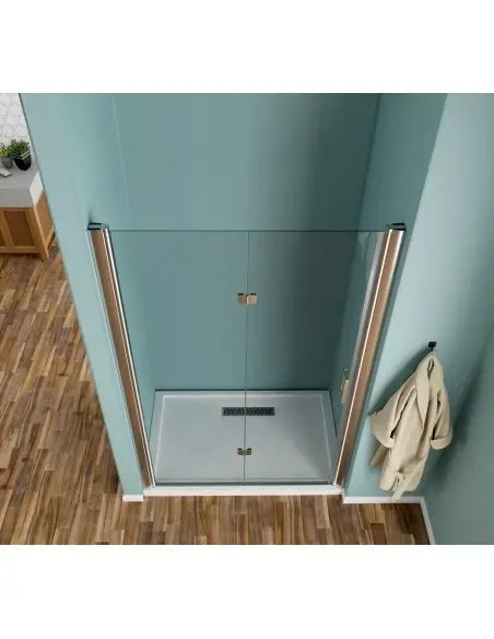 Porta doccia libro trasparente 6mm H190 vista dall'alto: doppia anta aperta a soffietto con profili cromati e piatto doccia rettangolare
