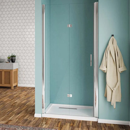 Porta doccia a libro trasparente 6mm H190 in bagno con pavimento in legno e piatto doccia: apertura a soffietto con maniglia acciaio inox