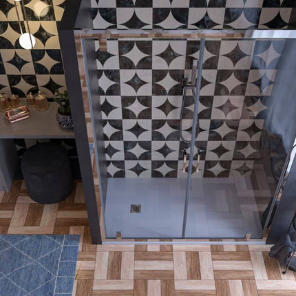 Porta doccia saloon 6mm trasparente H190 vista dall'alto con anta aperta verso l'interno, bagno con mosaico e piano lavabo
